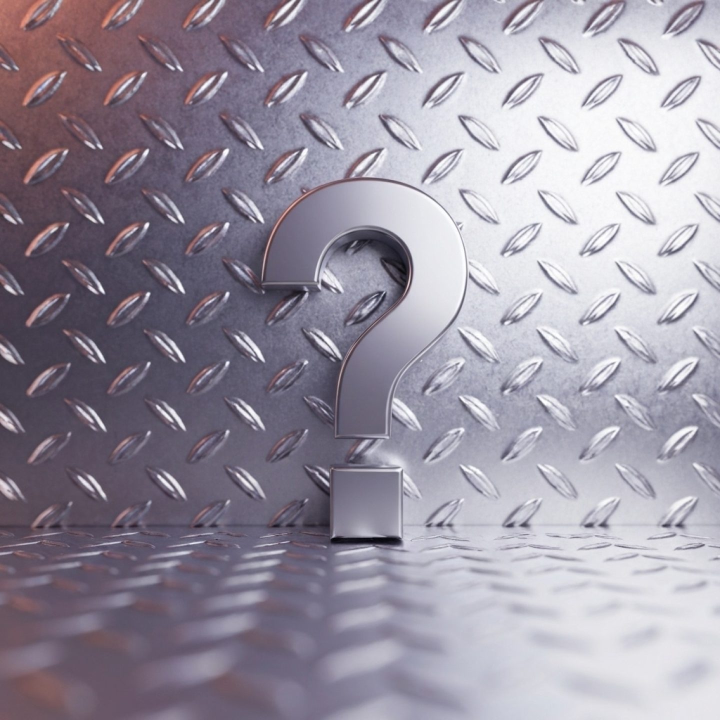 A metallic question mark stands upright on a textured diamond plate aluminium surface with a matching background, subtly raising environmental claims through its industrial design.